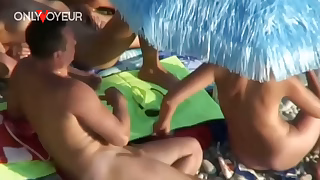 Beach Voyeur. Hardcore group sex in a beach swingers camp